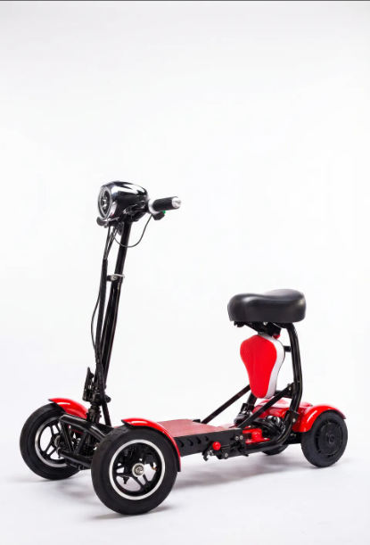 Elderly man riding a stable 4-wheel electric scooter in a park safely